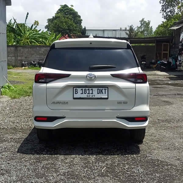 Back view Toyota Avanza 5-seater car for Ngurah Rai (DPS) Denpasar Bali Airport Transfer to Kraksaan, East Java transfer and Car Charter